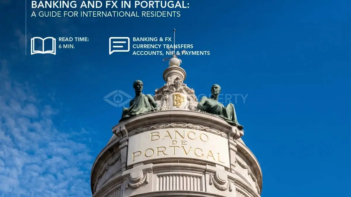 Banco de Portugal building facade with its stone statues against a blue sky, representing banking, currency and financial regulation for international residents in Portugal.